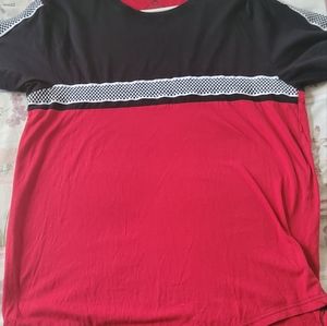 A red, black, and checker striped shirt. Size-large
